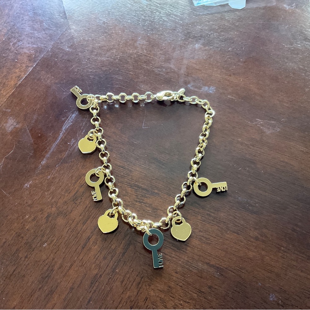 Stainless steel gold charm bracelet